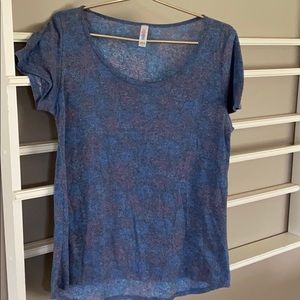 Blue T-shirt with subtle pink mixed in